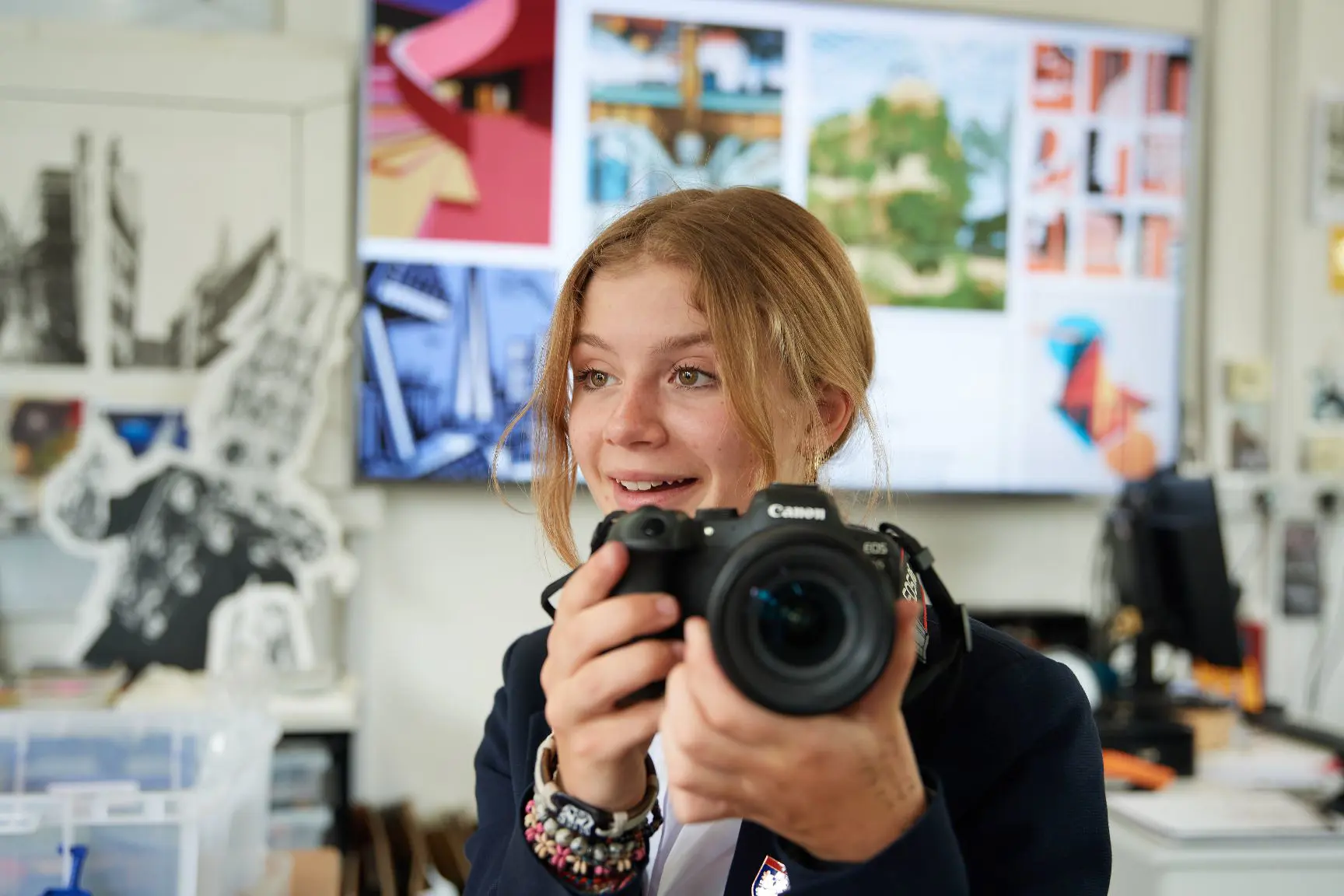 Girl holding a camera - Leighton Park School