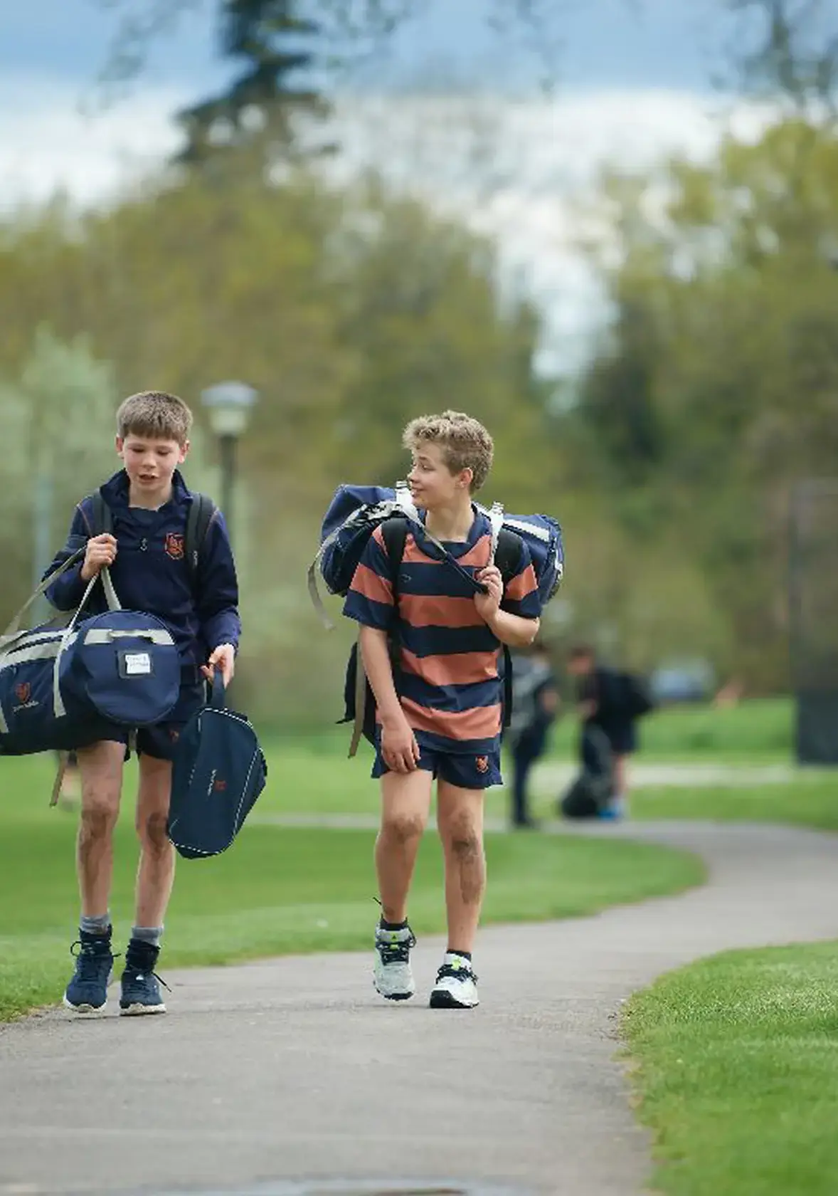 Two boys in sports kit