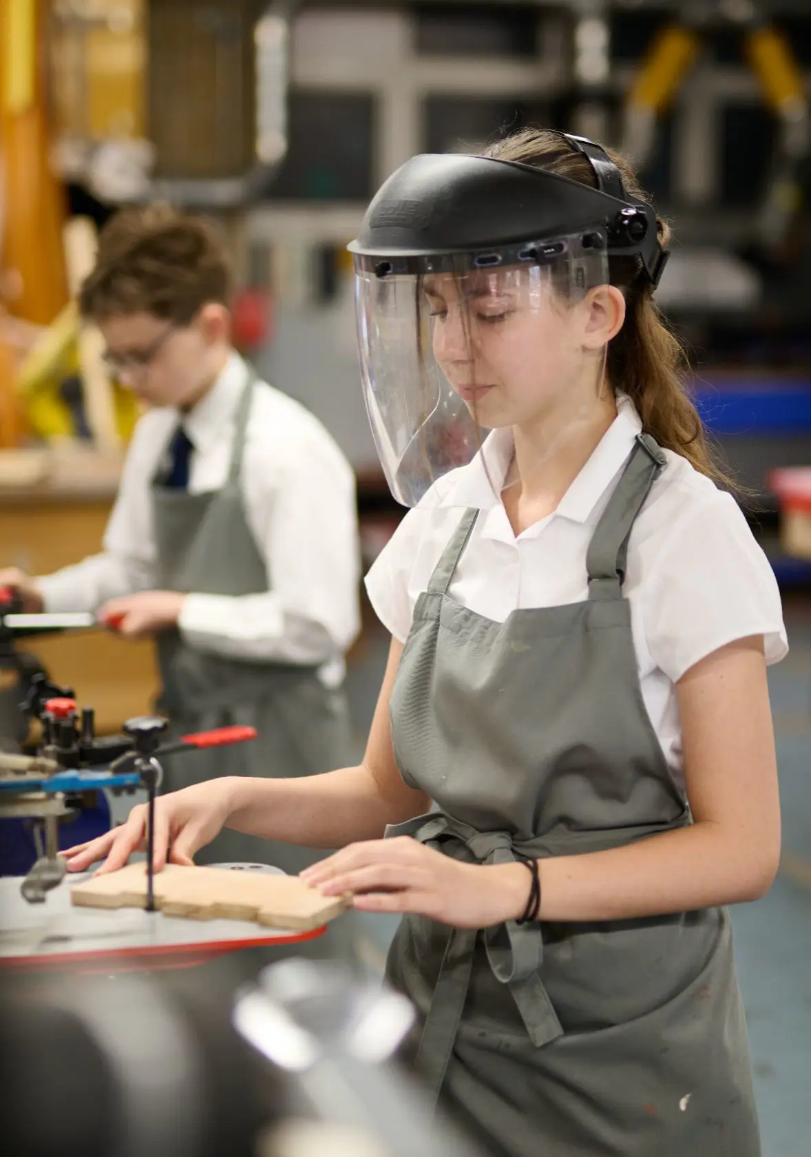 Young female student working on DT project