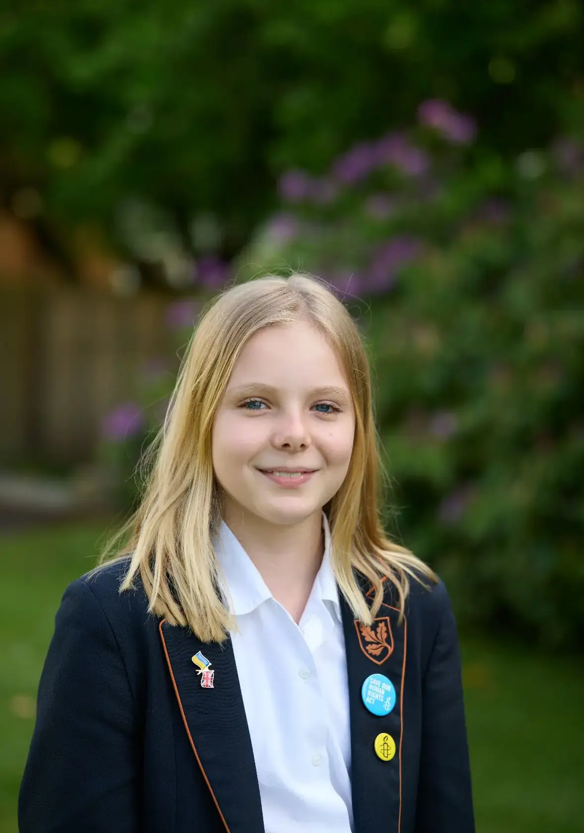 Young girl in uniform outdoors