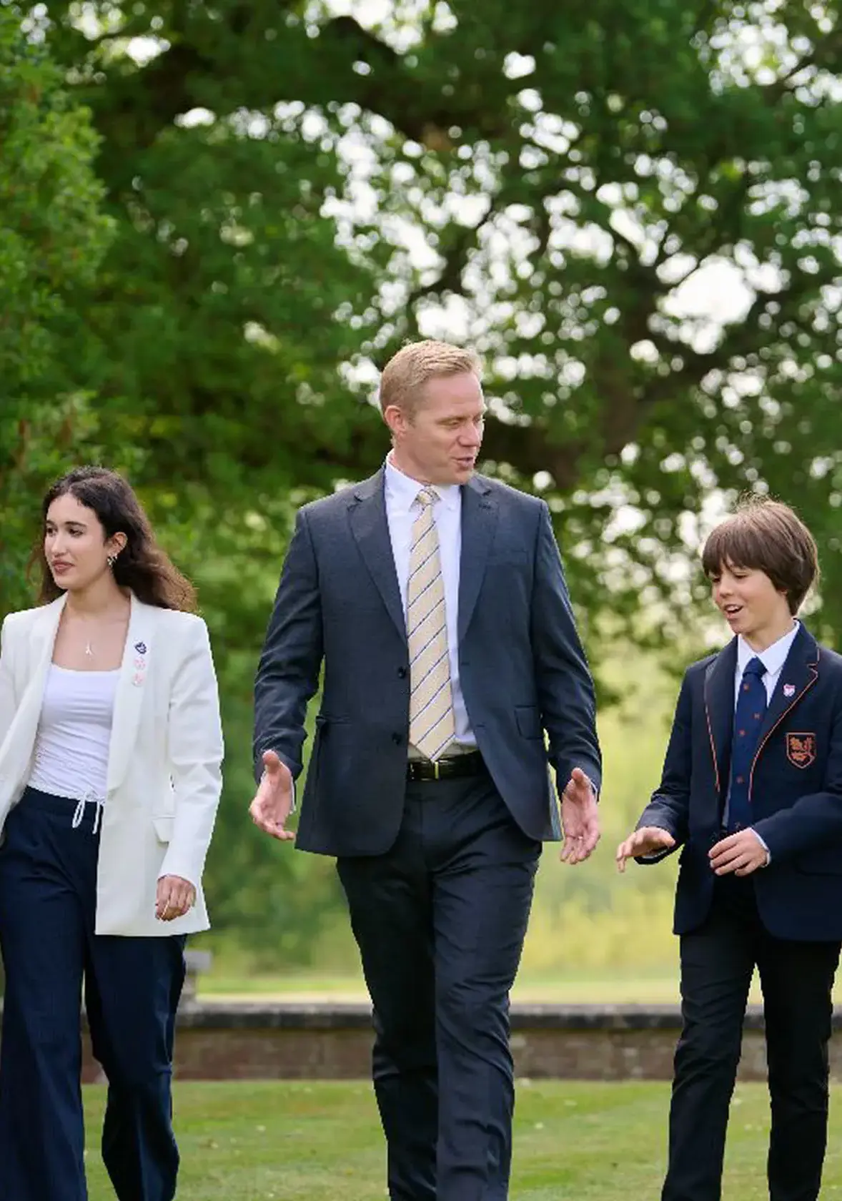 Teacher walking with students
