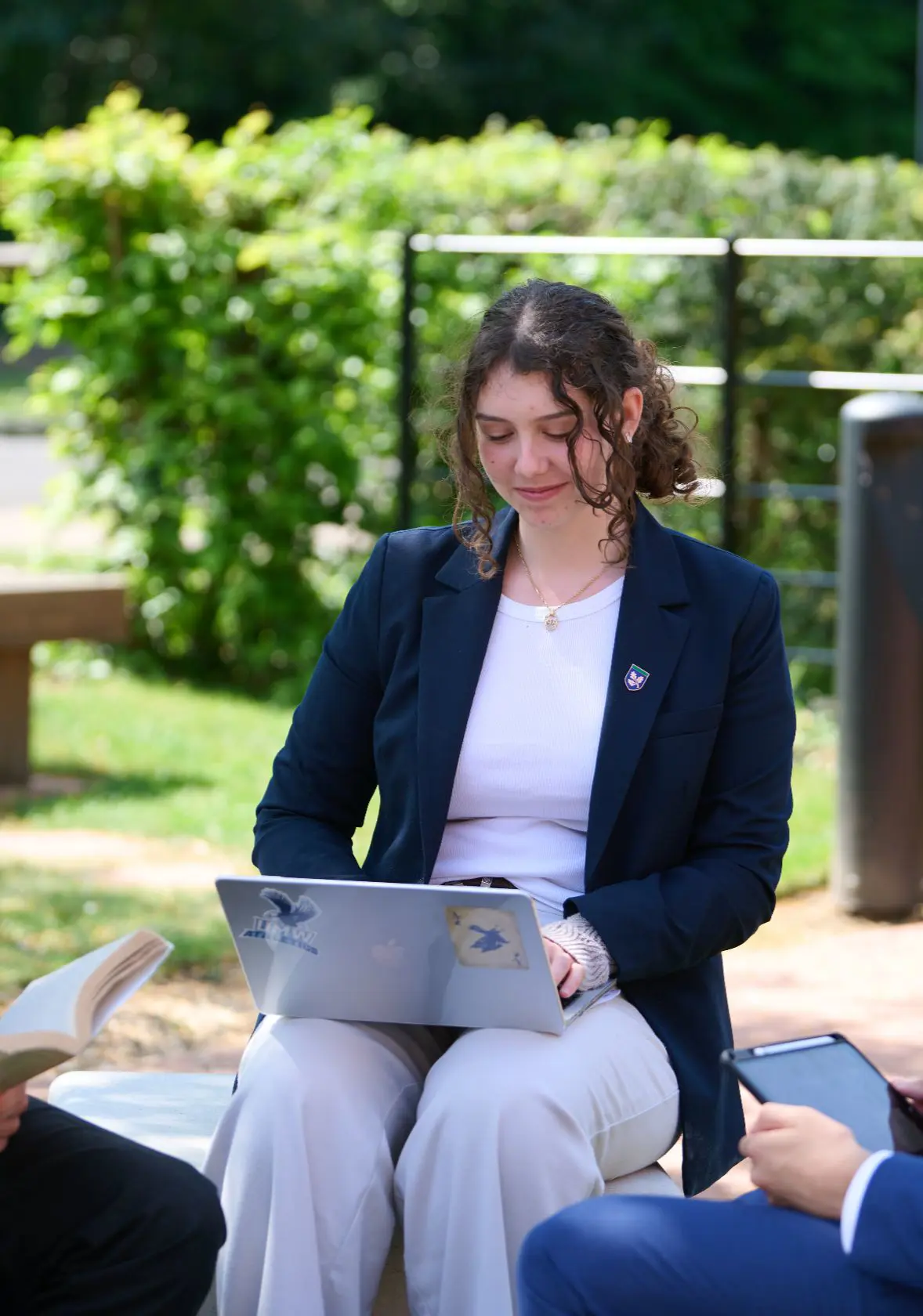 Older female student working on laptop