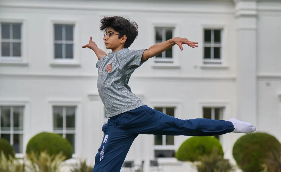 Student in dance pose