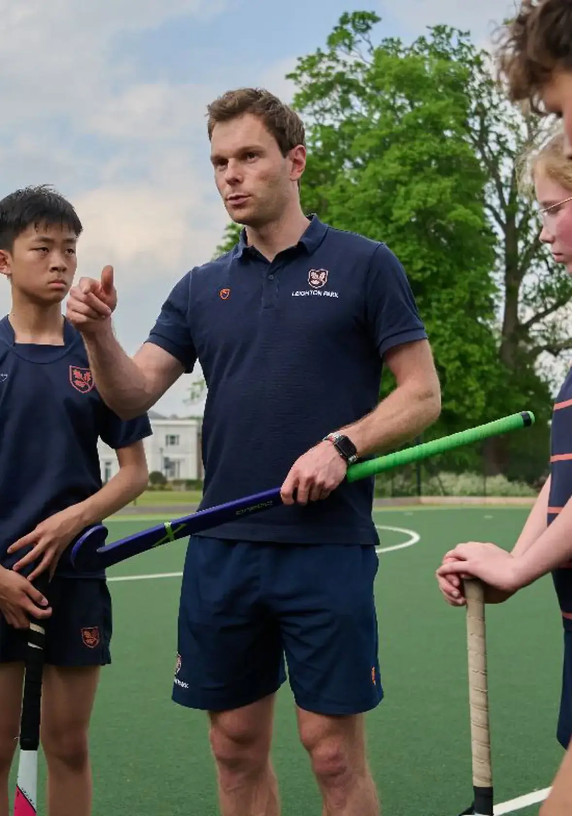 Hockey teacher speaking to students