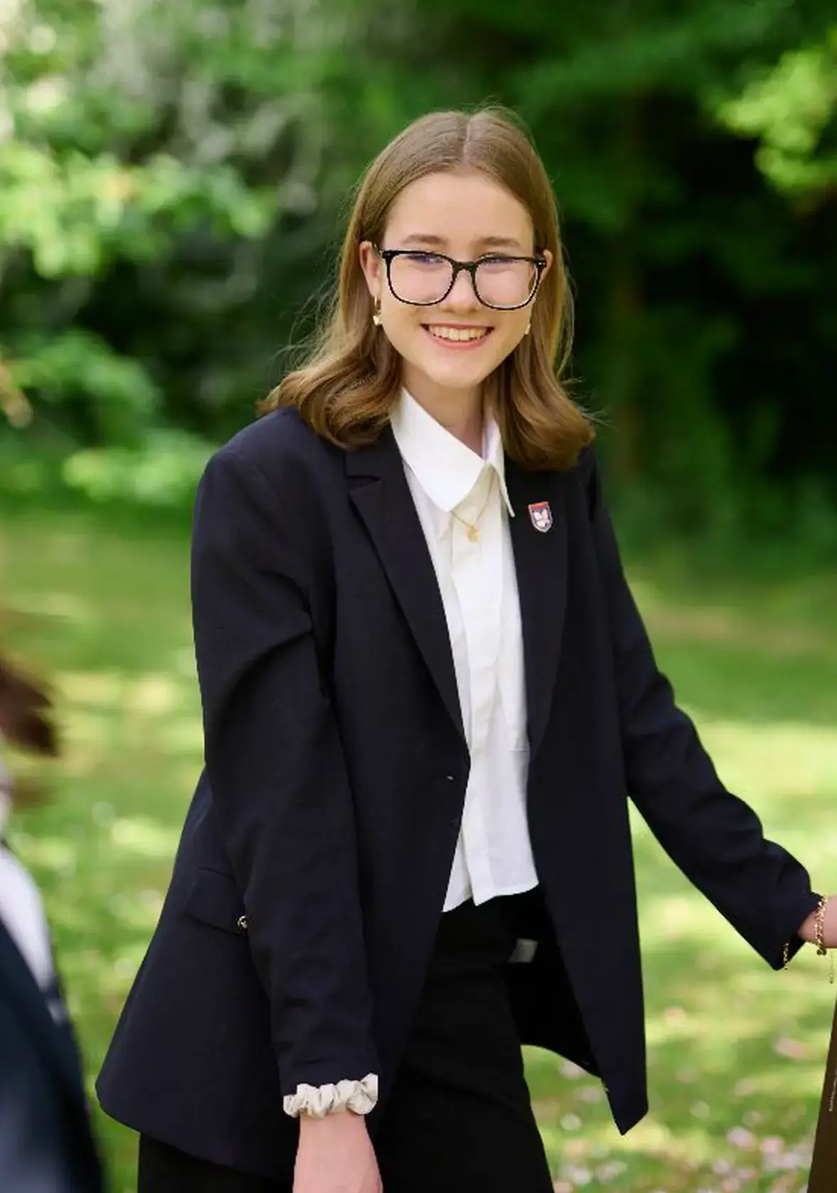 Year 9 girl outside with classmates