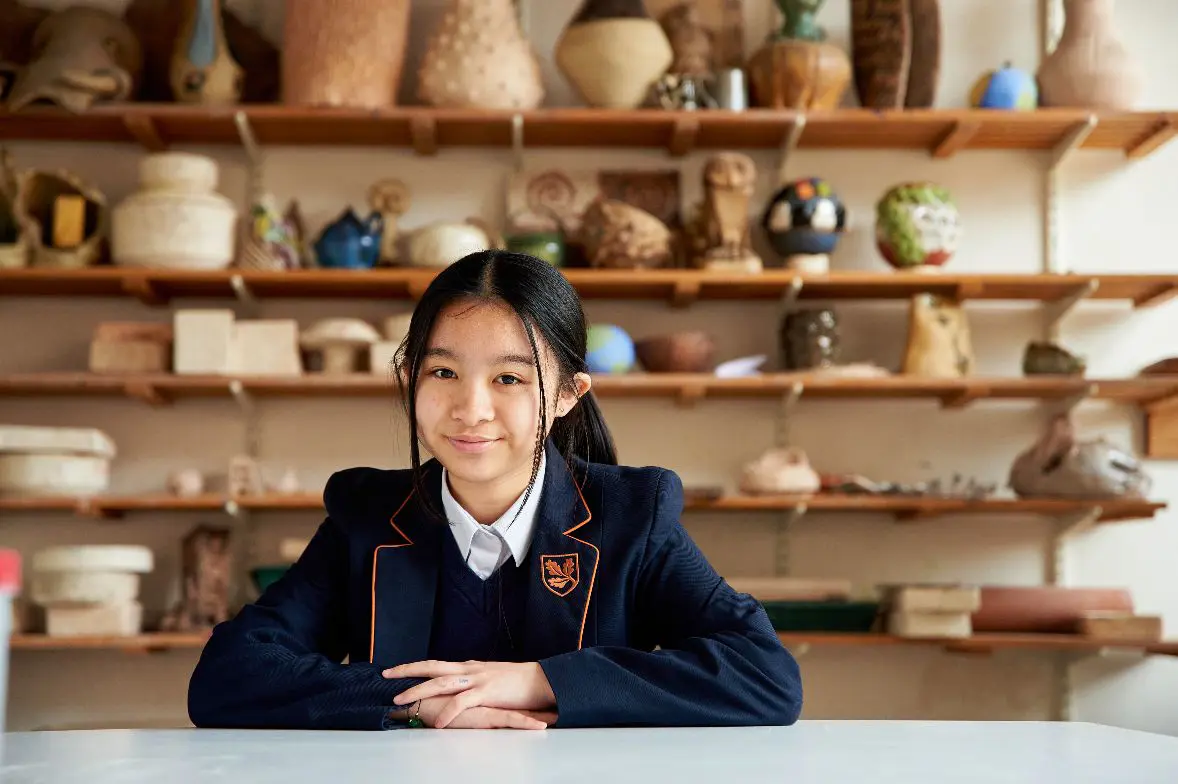 Student in ceramics studio