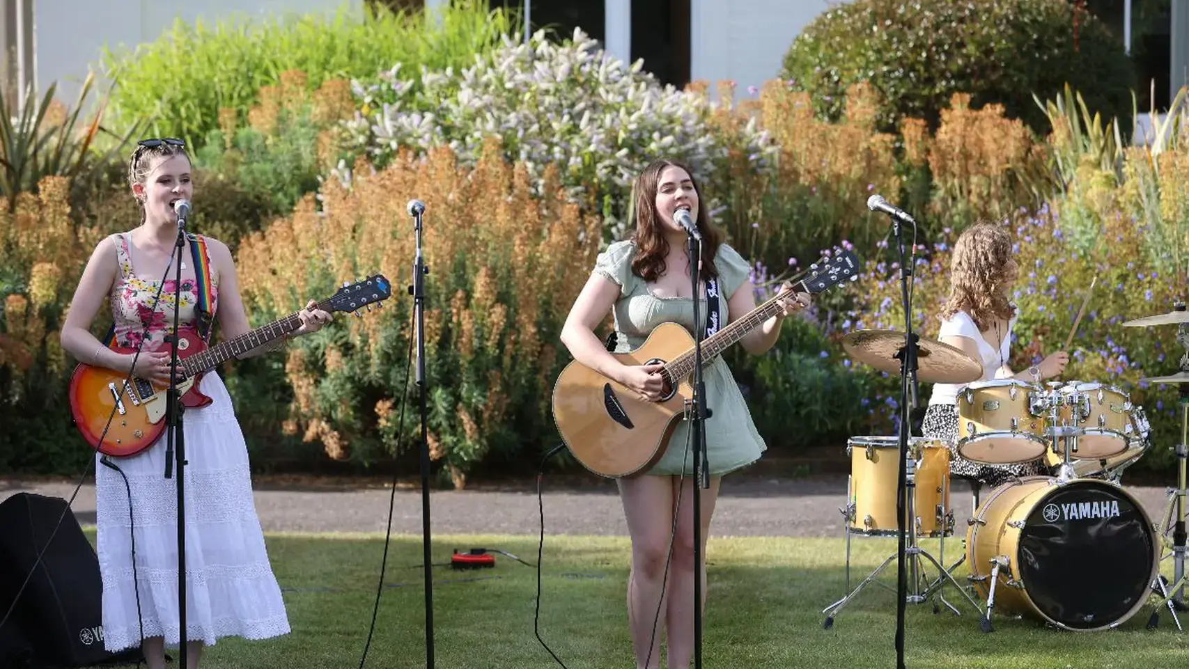 Students playing music outdoors