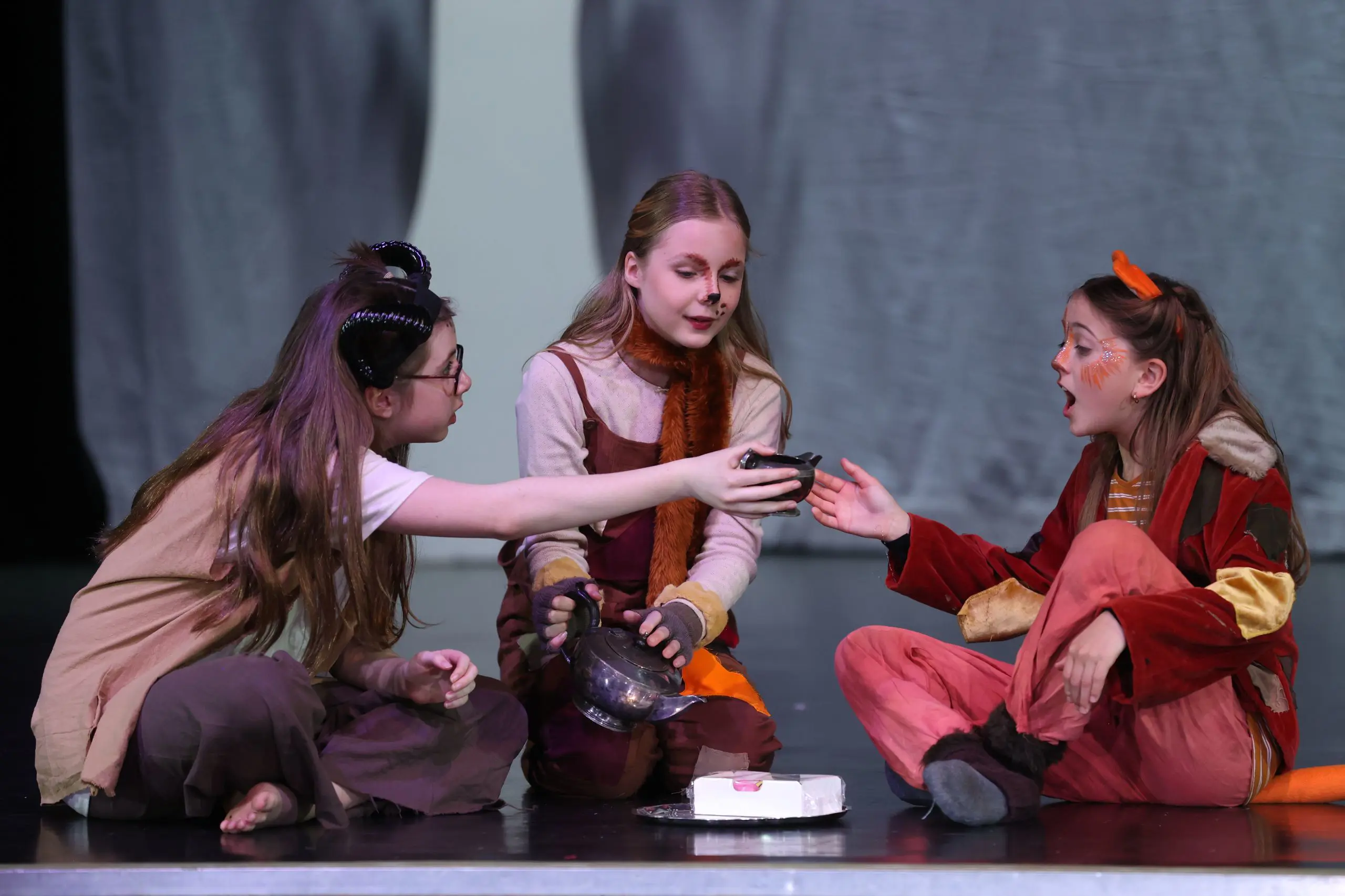 Drama students performing on stage - Leighton Park School