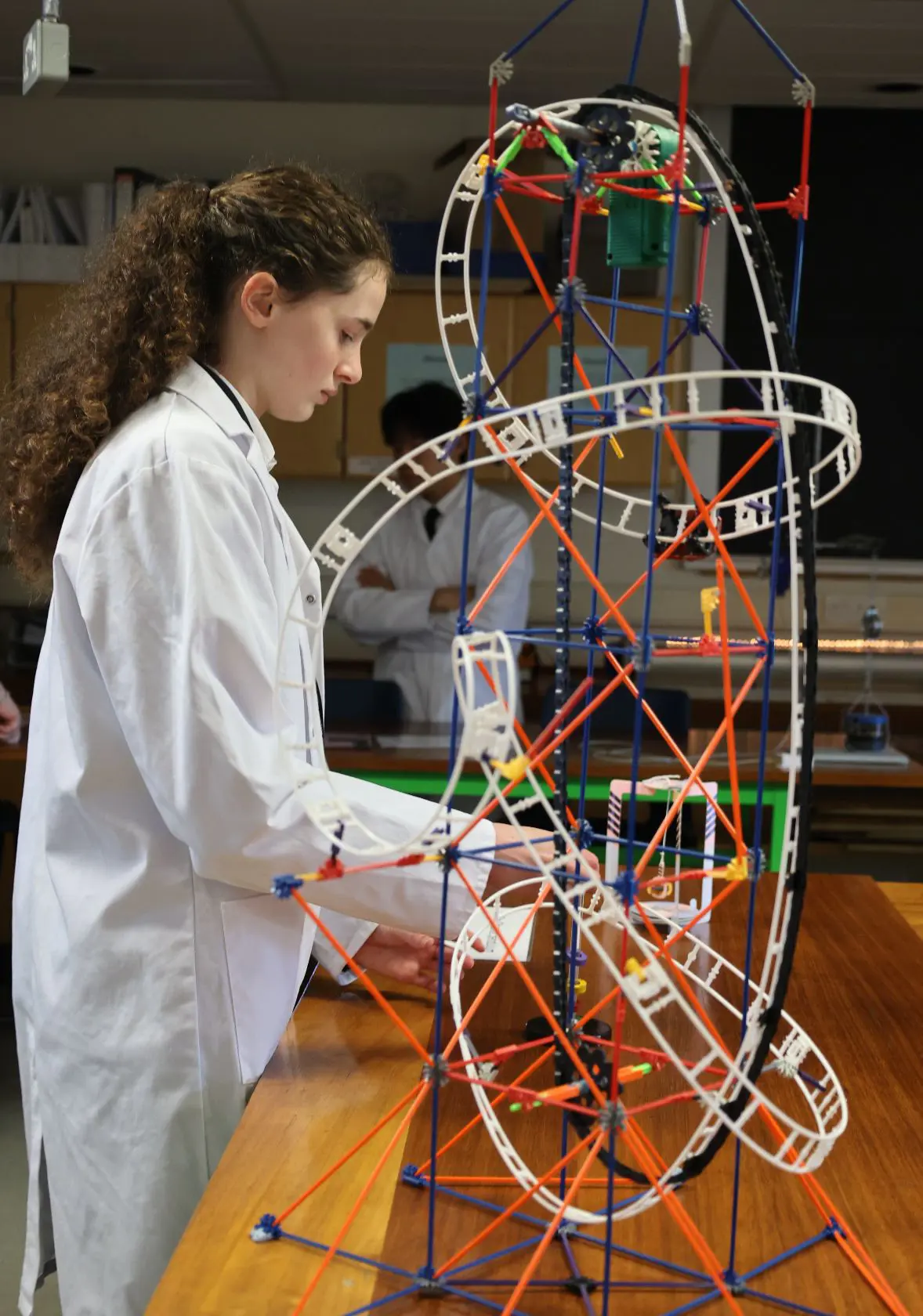 Girl creating STEM project