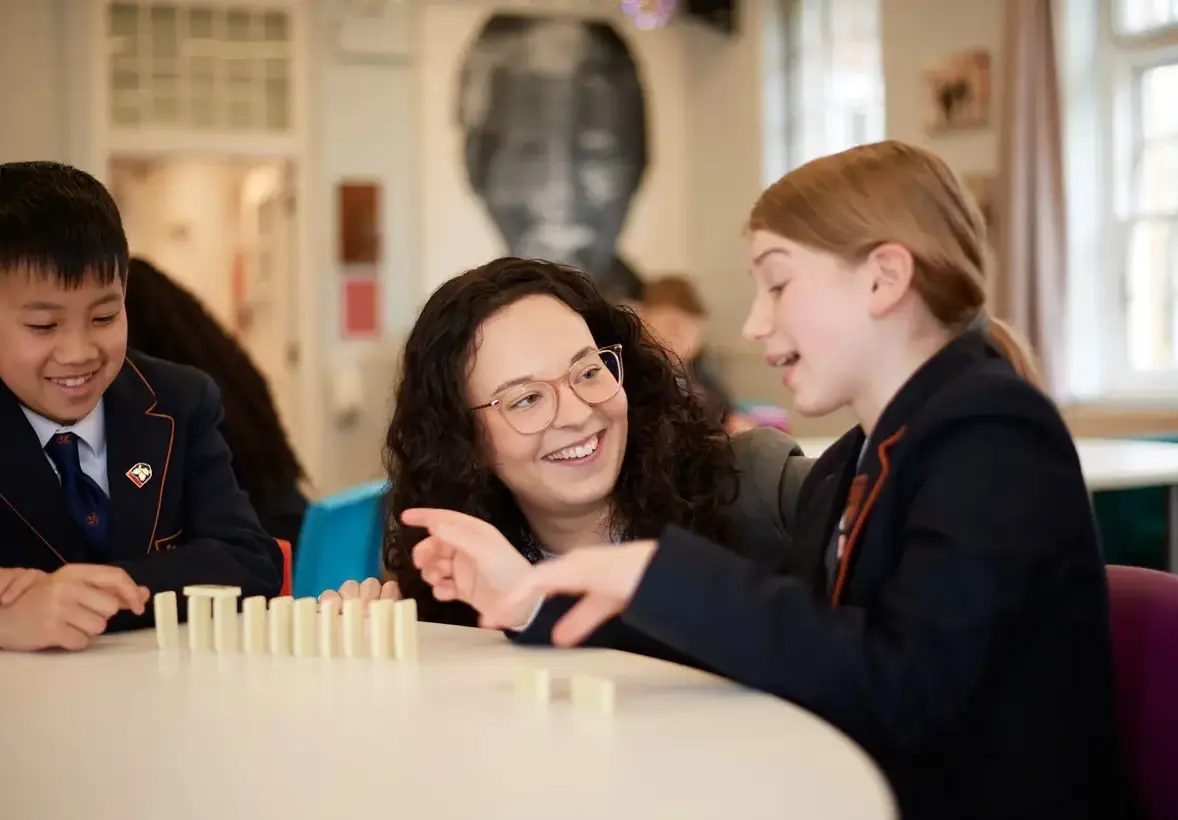 Teacher engaged with student's learning