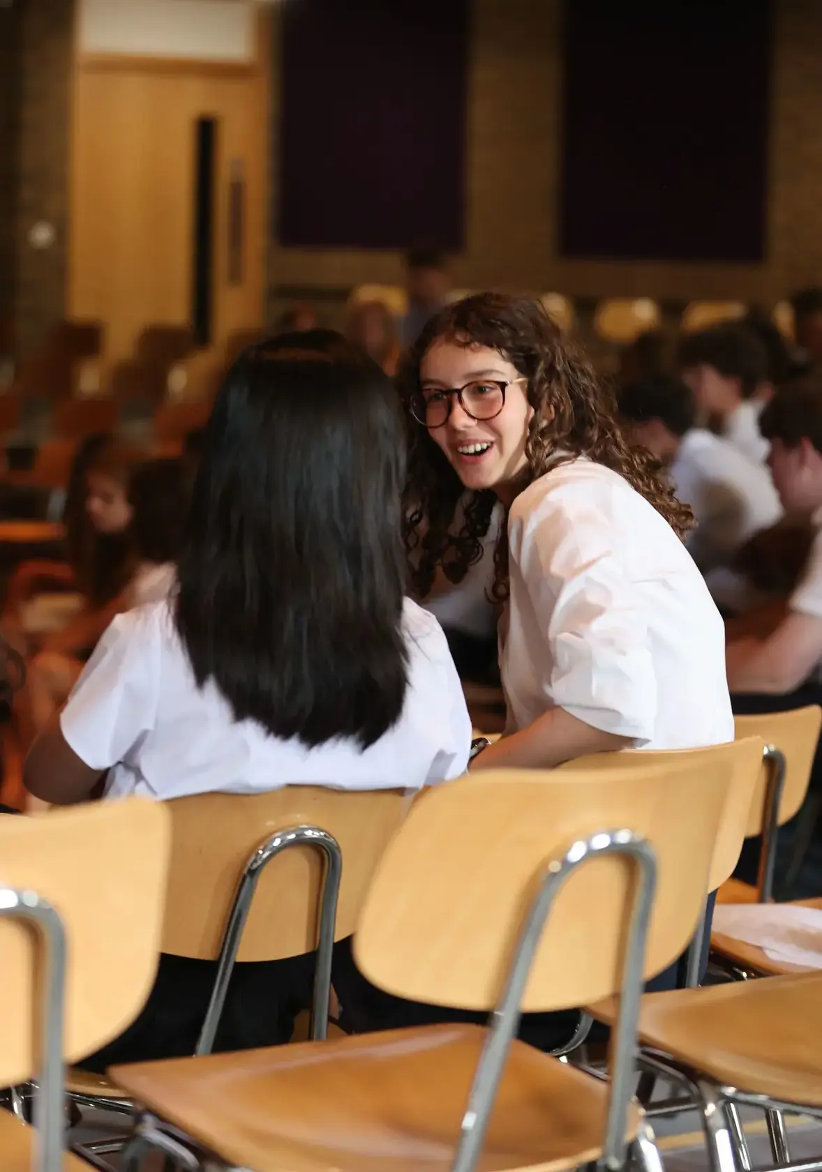 Older female students in assembly